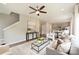 Bright living area with open layout, a cozy seating arrangement, and access to the dining area at 8029 Joy Crossing Ln, Charlotte, NC 28214