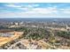 Stunning aerial view of a neighborhood adjacent to a golf course with mature trees and well-maintained homes at 815 Foxmeade Ct, Salisbury, NC 28144