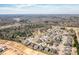 Aerial shot of a neighborhood highlighting a home's location amidst mature trees and community streets at 815 Foxmeade Ct, Salisbury, NC 28144