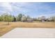 Large backyard with shed in view, and plenty of trees in the background at 815 Foxmeade Ct, Salisbury, NC 28144