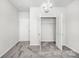 Neutral bedroom features plush carpeting, a closet, and modern chandelier at 815 Foxmeade Ct, Salisbury, NC 28144