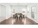 Dining room featuring hardwood floors, natural light, and modern light fixture at 815 Foxmeade Ct, Salisbury, NC 28144