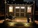 Charming outdoor shed with warm string lights, a wooden deck, and comfortable seating for relaxing evenings at 815 Foxmeade Ct, Salisbury, NC 28144