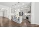 Bright kitchen with granite island, stainless appliances, pendant lighting, and hardwood floors at 815 Foxmeade Ct, Salisbury, NC 28144