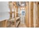 Interior of shed with plywood walls, pegboard, shelving and electrical outlets installed at 815 Foxmeade Ct, Salisbury, NC 28144