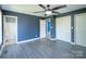 Bedroom featuring laminate floors and two closets, leading into the ensuite bathroom at 82 22Nd Nw Ave, Hickory, NC 28601