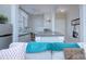 Charming kitchen featuring a tiled island and modern appliances, seamlessly connected to the living area at 1121 Myrtle Ave # 24, Charlotte, NC 28203