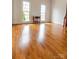 Spacious living room with hardwood floors, natural light, and beautiful finishings at 11215 Idlewild Rd, Matthews, NC 28105