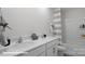 Well-appointed bathroom with double sinks, quartz countertops, and a shower-tub combination at 127 Meadow View Dr, Statesville, NC 28677