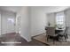 Dining room with hardwood floors and decorative plants at 127 Meadow View Dr, Statesville, NC 28677