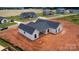 Aerial view of modern home, showcasing the landscaping and curb appeal at 1370 Coppergate Dr, Salisbury, NC 28147