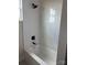 Modern bathroom with white subway tile and sleek black hardware in shower/tub combo at 1370 Coppergate Dr, Salisbury, NC 28147