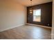 Bedroom with a black accent wall, large window and ample natural light at 1370 Coppergate Dr, Salisbury, NC 28147