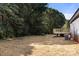 Exterior view showing the deck and back yard of the home at 141 Lakewind Dr, Mooresville, NC 28115