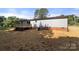 Exterior view showing a deck and back yard of the home at 141 Lakewind Dr, Mooresville, NC 28115