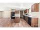 Bright kitchen with black appliances and island, perfect for cooking and entertaining guests at 141 Lakewind Dr, Mooresville, NC 28115