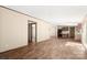 Open-concept living room showcases modern flooring and neutral walls, providing versatile space for relaxation and entertaining at 141 Lakewind Dr, Mooresville, NC 28115