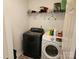 Efficient laundry room equipped with modern washer and dryer at 14117 Hiawatha Ct, Huntersville, NC 28078