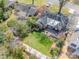 Aerial view of the property highlighting the spacious backyard and deck at 1623 Geneva Ct, Charlotte, NC 28209