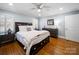 Comfortable bedroom with a ceiling fan, large bed and ample natural light at 1623 Geneva Ct, Charlotte, NC 28209