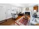 Cozy living room featuring a fireplace, hardwood floors, and elegant furnishings for a relaxing space at 1623 Geneva Ct, Charlotte, NC 28209