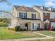 Beautiful exterior showcasing a two-story home with neutral siding and landscaped yard at 2012 Oakstone Dr, Monroe, NC 28110