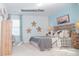 Cozy bedroom featuring a stylish bed, modern decorations, and plenty of natural light, creating a relaxing retreat at 203 Giant Oak Ave, Statesville, NC 28677