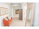 Hallway with neutral walls, carpet, seating, and decorative accents, creating a welcoming and functional space at 203 Giant Oak Ave, Statesville, NC 28677