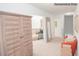 Bright hallway with neutral walls, carpet, seating, and closet, creating a welcoming and functional space at 203 Giant Oak Ave, Statesville, NC 28677