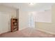 Spacious bonus room featuring neutral walls, carpeted flooring, and two entry doorways at 205 Cowboys Cir, Rock Hill, SC 29732