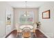 Cozy dining room filled with natural light and hardwood flooring at 205 Cowboys Cir, Rock Hill, SC 29732