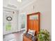 Bright entryway with a hall tree bench, hardwood flooring and decorative glass front door at 205 Cowboys Cir, Rock Hill, SC 29732