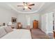 A main bedroom featuring a rocking chair, neutral paint, and a traditional wood dresser at 205 Cowboys Cir, Rock Hill, SC 29732