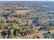 Expansive aerial view of a residential area with a mix of homes, trees, and a local baseball park at 210 W Lee Ave, Bessemer City, NC 28016