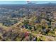 Picturesque aerial shot of a community with Crowders Mountain visible, adding to the scenic backdrop at 210 W Lee Ave, Bessemer City, NC 28016