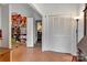 Hallway to additional bedroom with access to closet and living area at 210 W Lee Ave, Bessemer City, NC 28016