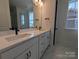 Elegant bathroom with double vanity, quartz countertops, and black fixtures at 255 Luray Way # 442, Rock Hill, SC 29730