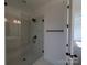 Modern glass-enclosed shower with marble tile surround and black fixtures at 255 Luray Way # 442, Rock Hill, SC 29730