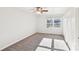 Bedroom with carpet and a ceiling fan with lights, a window, and a closet with louvered doors at 2611 Rolling Hills Dr, Monroe, NC 28110