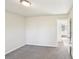 Bedroom with carpet and neutral walls, an open door to an adjacent room, and recessed lighting at 2611 Rolling Hills Dr, Monroe, NC 28110