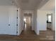 Bright hallway with wood floors leading to other rooms at 263 Luray Way # 444, Rock Hill, SC 29730