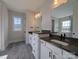 Contemporary bathroom featuring double vanity sinks, quartz countertops, and tiled floors at 267 Luray Way # 445, Rock Hill, SC 29730