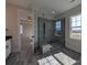 Modern bathroom boasting a glass-enclosed shower with tile surround and a built in bench at 267 Luray Way # 445, Rock Hill, SC 29730