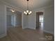 Bright dining room features modern flooring and modern light fixture at 267 Luray Way # 445, Rock Hill, SC 29730