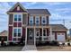 Charming two-story home with a covered porch and landscaped front yard at 267 Luray Way # 445, Rock Hill, SC 29730