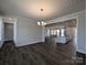 Spacious dining room with modern chandelier and an open floor plan at 275 Luray Way # 447, Rock Hill, SC 29730