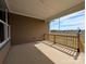 This covered patio features a concrete surface with a wooden safety rail at 275 Luray Way # 447, Rock Hill, SC 29730