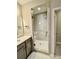 Bathroom featuring double sinks, and a glass shower at 278 W Waterlynn Rd, Mooresville, NC 28117