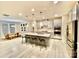 Modern kitchen with stainless steel appliances, a large center island with bar seating, and pendant lighting at 278 W Waterlynn Rd, Mooresville, NC 28117