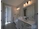 Elegant bathroom featuring dual vanities, stylish lighting, and sleek black hardware accents at 279 Luray Way # 448, Rock Hill, SC 29730